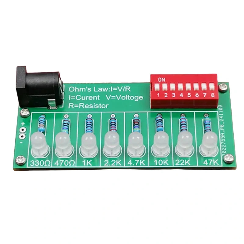 Electronic component board with resistors and labels on a red background
