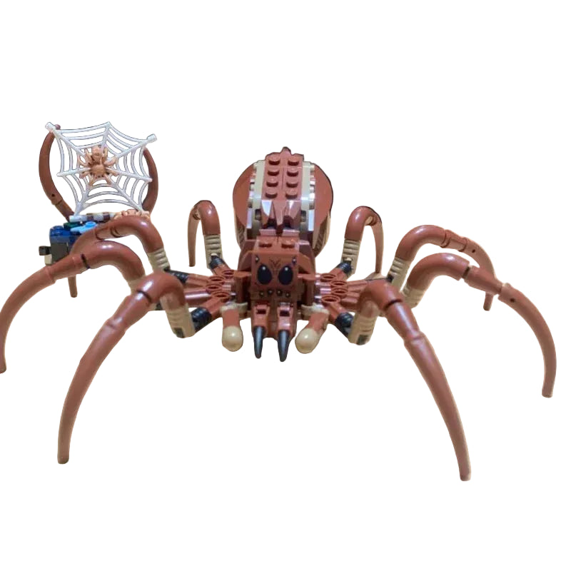 Toy spider made of interlocking bricks on a wooden surface